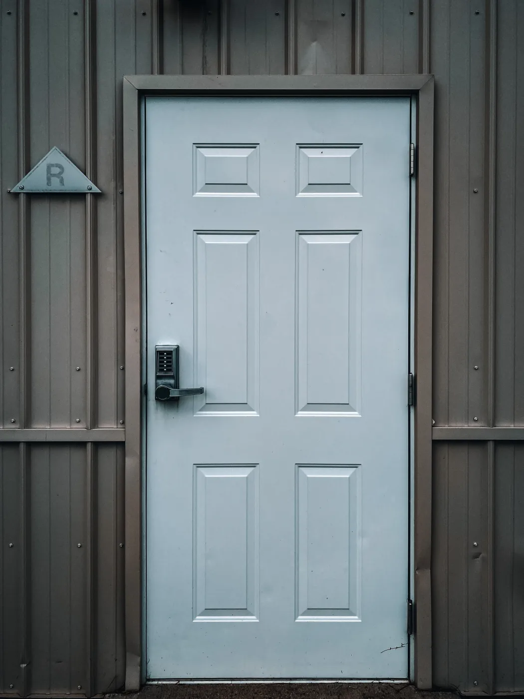 Modern security door with integrated keypad lock system